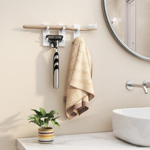 Load image into Gallery viewer, Self-Adhesive Wall Hooks - 4 Pack, Black Metal Coat &amp; Towel Hooks for Hanging: Hold 13 LB, Ideal for Bathrooms, Shower, Kitchen &amp; Doors